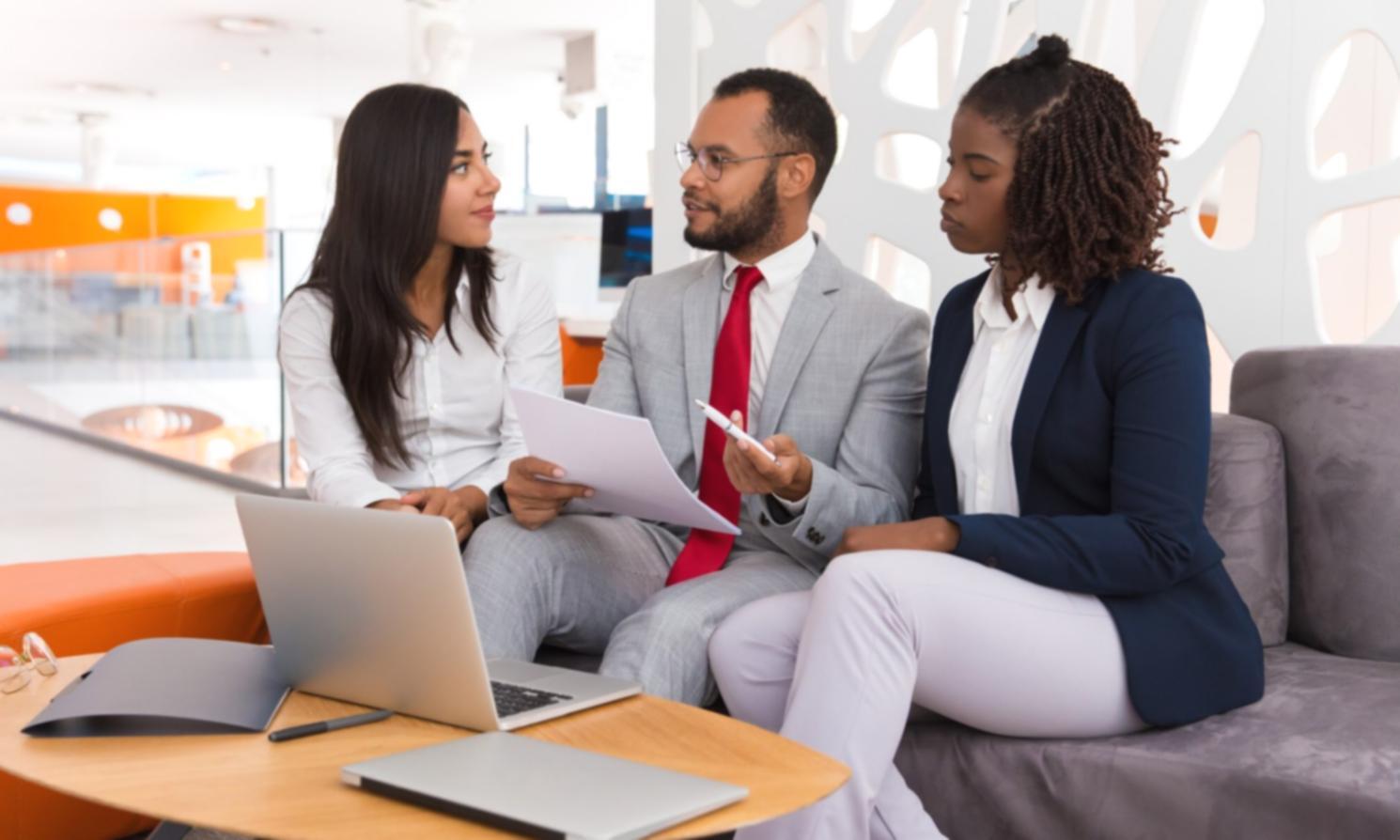 Business professional reviewing financial statements and analysis reports
